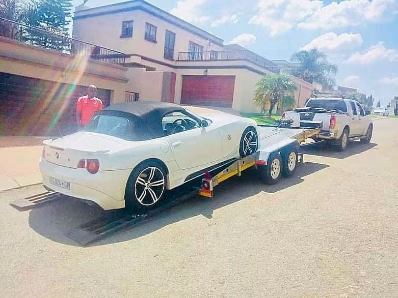 FRC driver handing over a recovered vehicle to a client